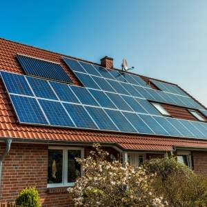 Solar panel on a red roof